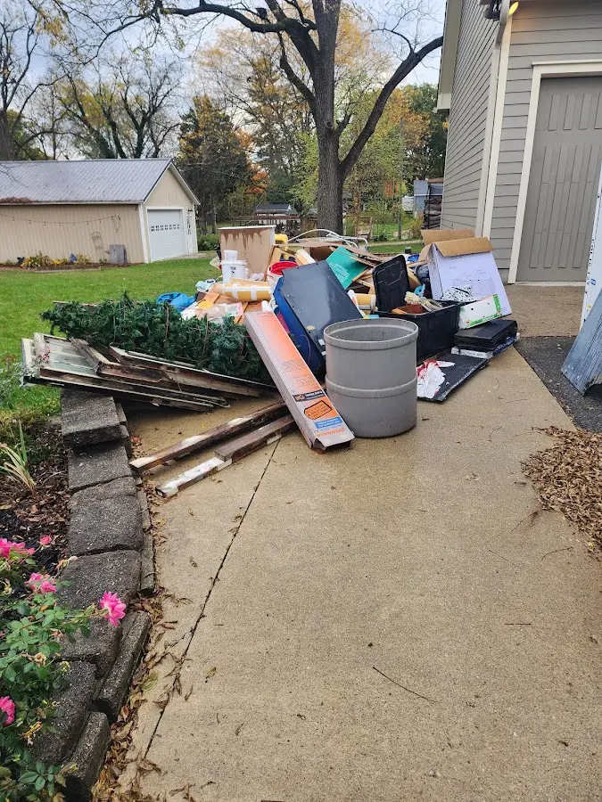 Dumpster being loaded with debris for Commercial Dumpster Rental in Louisiana